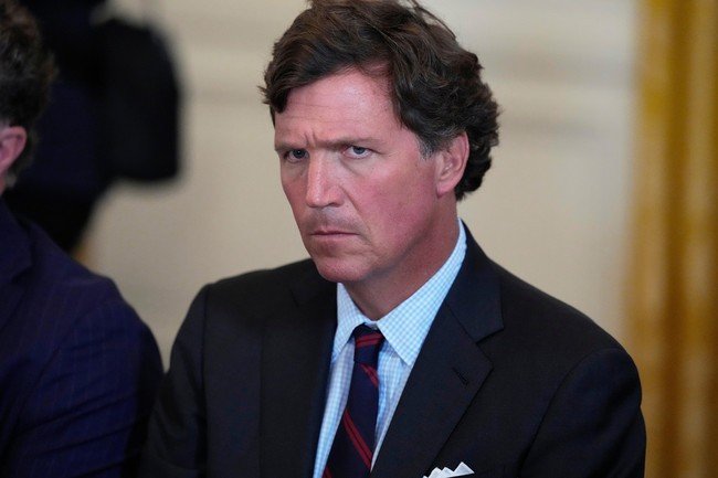 Tucker Carlson Calls for Treason Trials Against Trump Over Israel Defense Bill