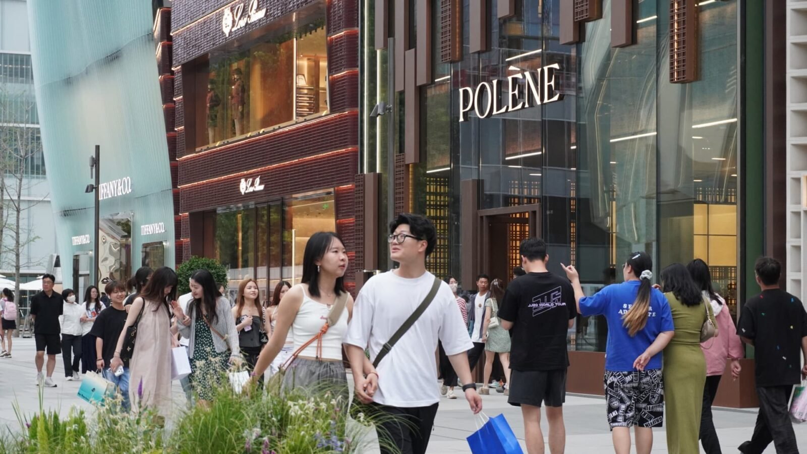 China's economy loses momentum across the board in July, retail sales barely grow