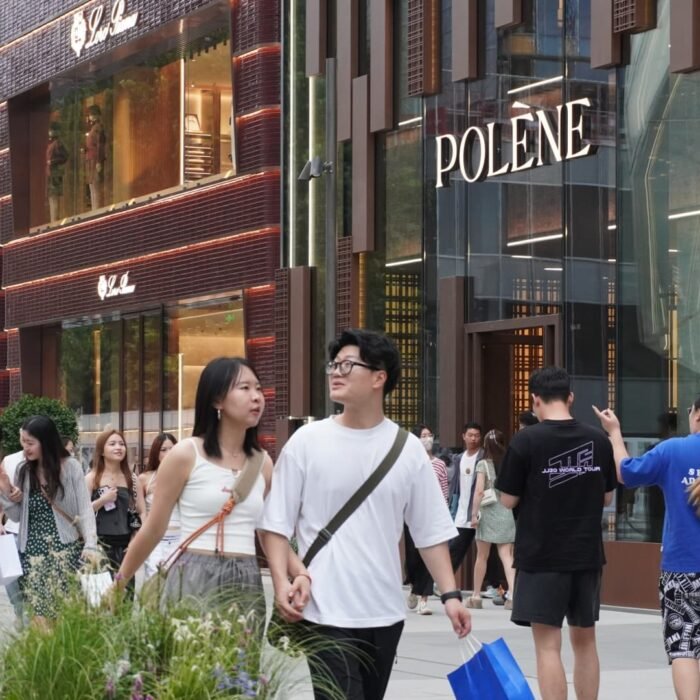 China's economy loses momentum across the board in July, retail sales barely grow